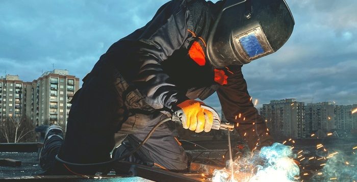 person welding