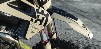 husqvarna dirtibke closeup looking at graphics