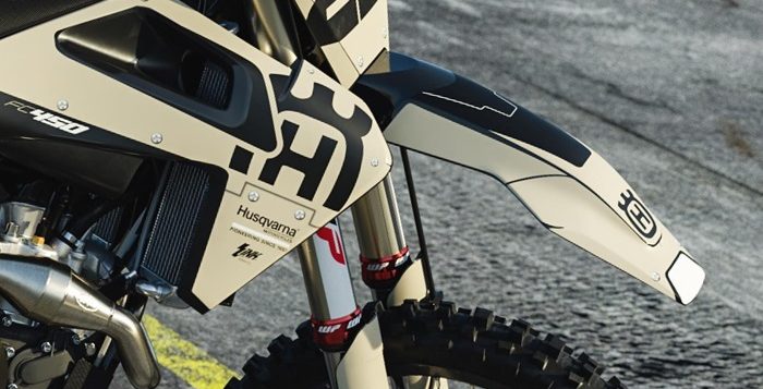 husqvarna dirtibke closeup looking at graphics